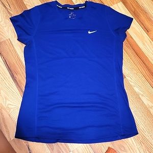 Nike dri-fit running shirt in size Small and color blue.